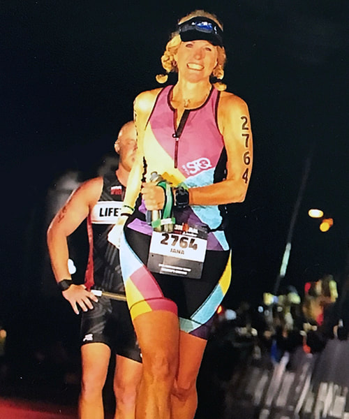 Picture-Jana Rugg completing an Ironman